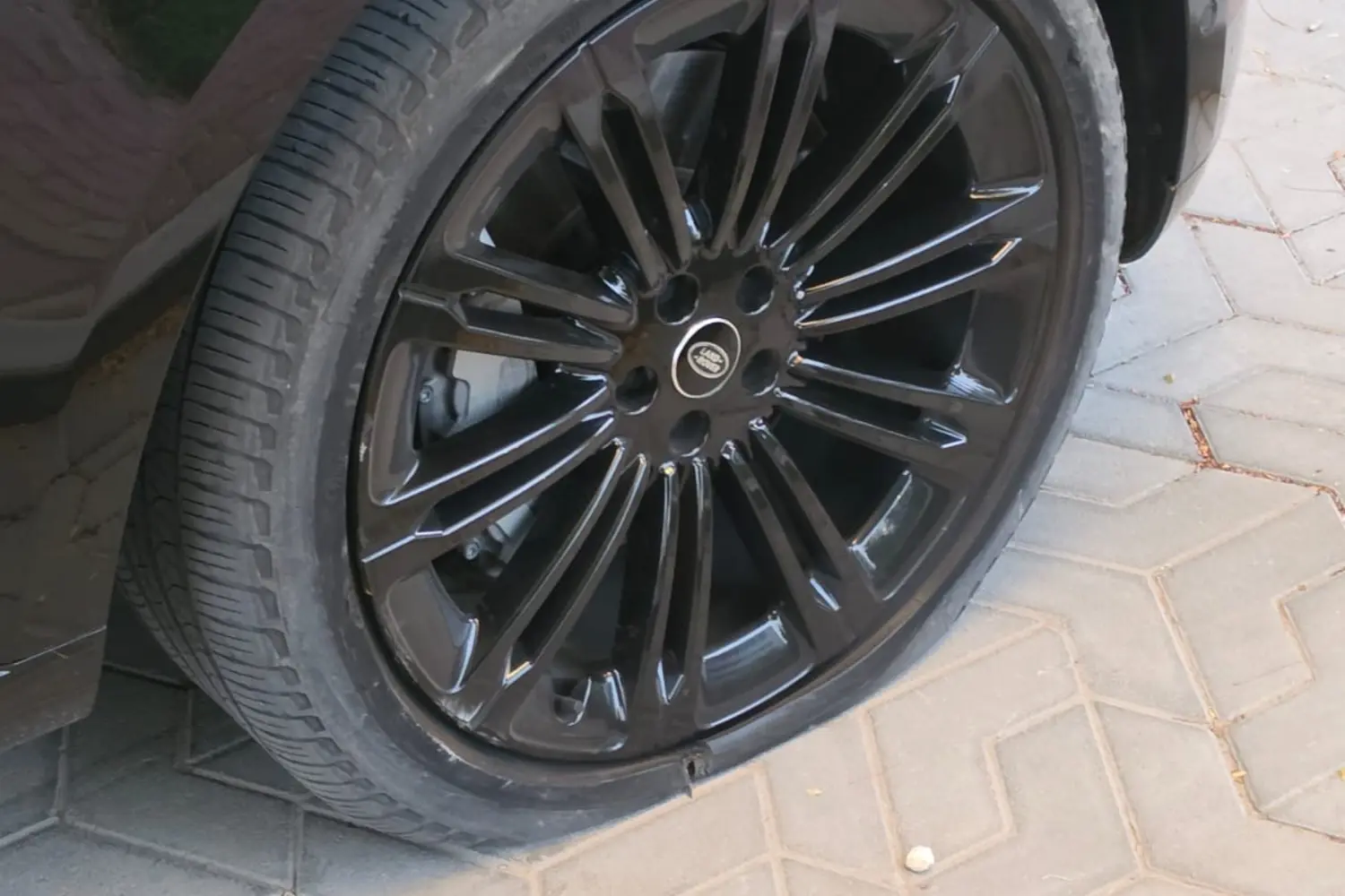 Vehicle wheel checked during a mobile tyre visit